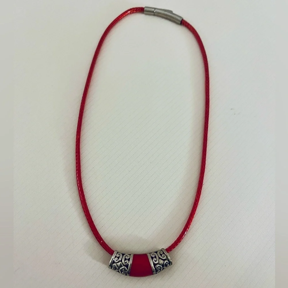 Sterling silver & leather chord necklace with Celtic pendant